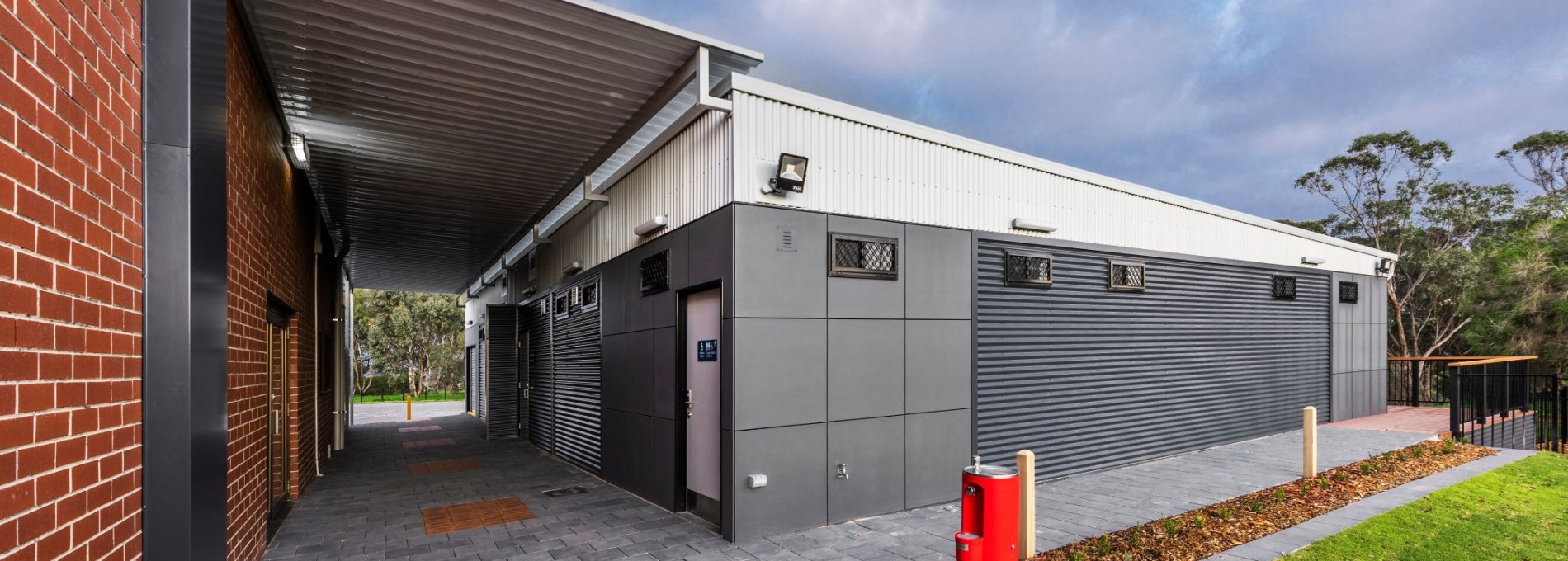 Modular Toilet Facilities with Paved Path and Covered Walkway