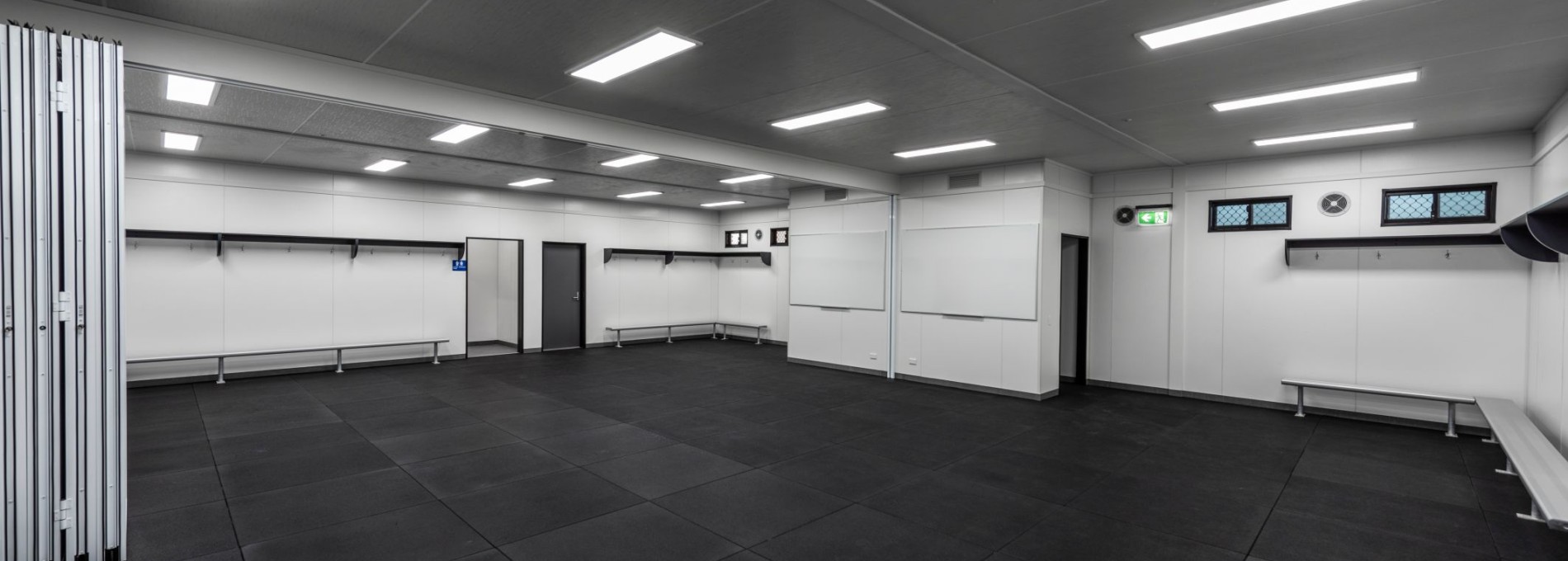 Sporting Change Room with Bifold Door, Benches and Shelving