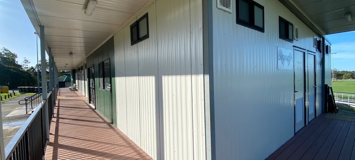 Modular Sports Building with Deck and Metal Panelling